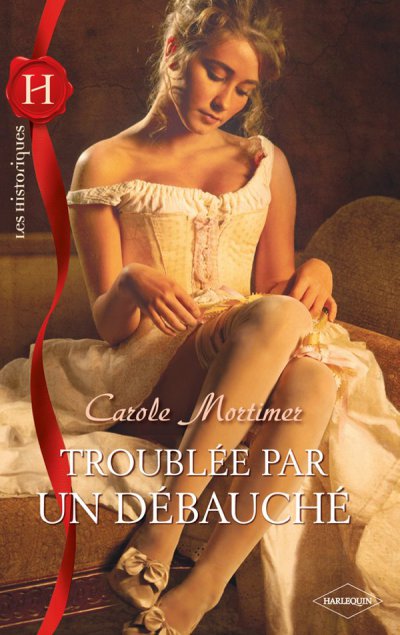 Troublée par un débauché de Carole Mortimer